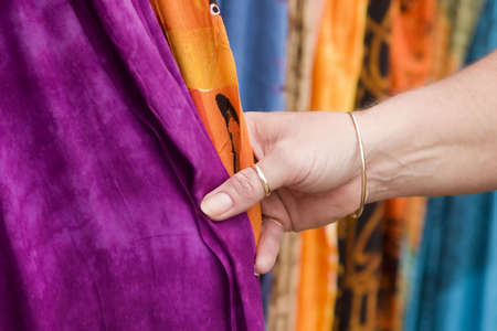 woman touching fabricの写真素材