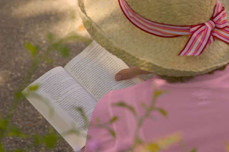 enjoying a bookの写真素材