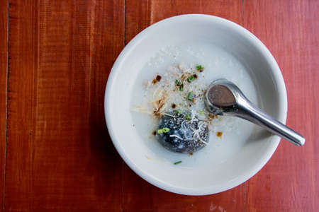 Hot and delicious gruel in a bowlの写真素材
