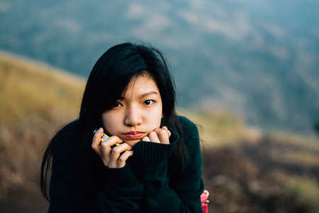 The cute Asian girl in green tshirt.の写真素材