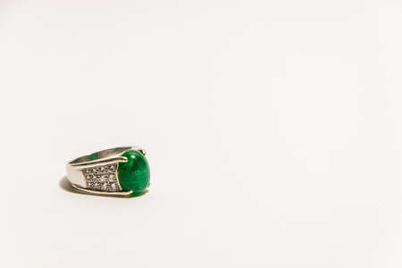 Emerald ring with diamond.