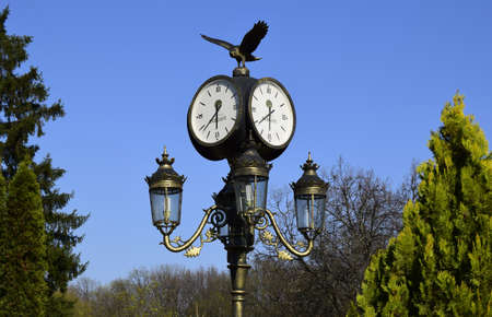 Clock on a street lamp. Ukraine, Kharkov, Feldman Ecoparkのeditorial素材