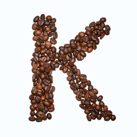 English Coffee Alphabet isolated on white. Roasted coffee beans. ?offee letter - Kの写真素材