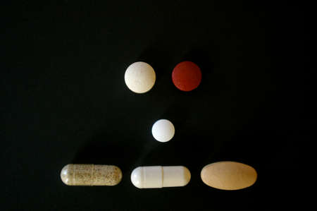 Medication pills forming a flat faceの写真素材