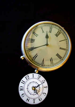 Vintage clocks on black background