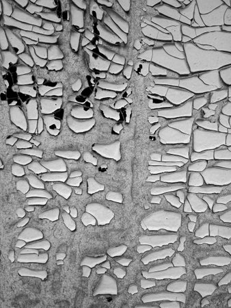 abstract background of peeling paint on a wall. black and white