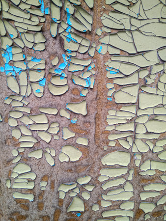 Old cracked paint on rusty metal surface. Abstract background and texture for design