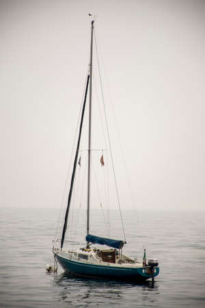 Italy a anchored sailing boat at the Italian Riviera - Liguriaの写真素材