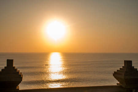 Bali Indonesia at holy Uluwatu Temple coastline ocean sunset 2の写真素材