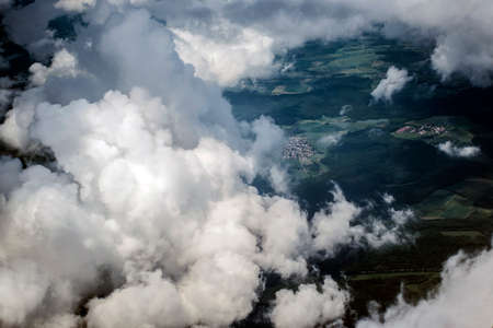 Aerial view Top cumulus clouds flying high over landの写真素材