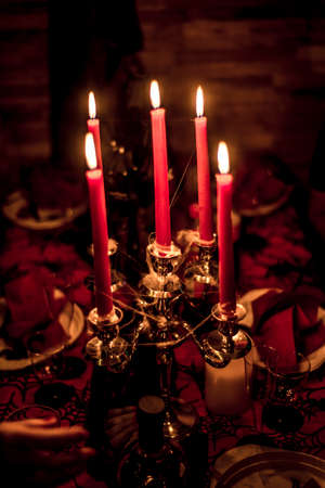 Halloween Party with candle light table dark decorationの写真素材