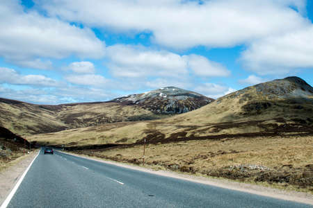 Road driving through Highlands Mountain Scotland UK 3の写真素材