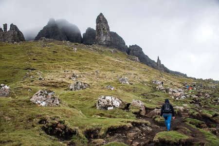 Girl Hiking the Old Man of Storr Isle Skye in Scotland UK