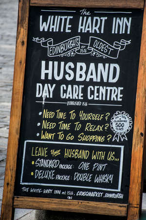 Scotland United Kingdom Edinburgh 14.0 5.2016 - The White Hart inn Sign Husband Day Care centreのeditorial素材