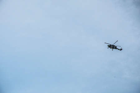 Oman in dhofar region Military helicopter flying blue skyの写真素材