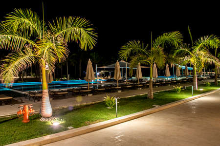 Oman, Salalah, 19.10.2016 -Amazing night lights at Hotel Al Fanar Souly Bay Hotels pool palmsのeditorial素材