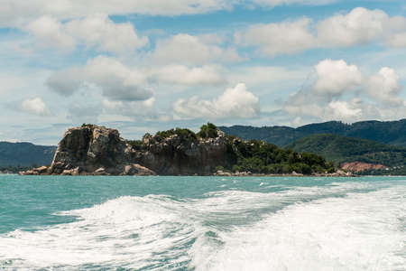 speed boat motor water wave Beautiful rock sea with blue sky in Koh Samui Thailandの写真素材