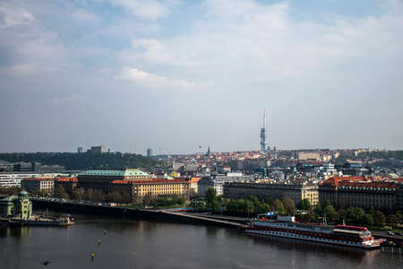 Czech Republic Prague capitol city skyline view over the roof river buildings bridgesの写真素材