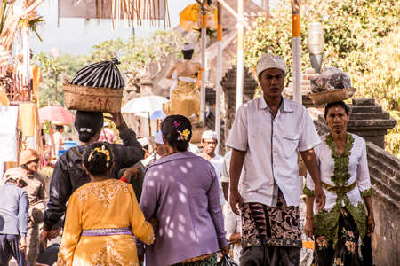 Indonesia Bali 09.10.2015 Local people at Pura besakih mother temple during big ceremonyのeditorial素材
