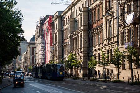 Poland krakow - 08.05.2015 - old tram carriages transportation train downtown area historic buildingsのeditorial素材