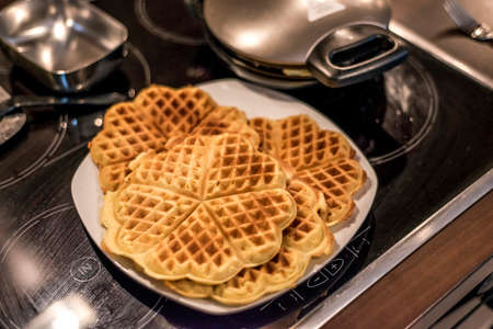 Baking Homemade waffles cooked in a waffle ironの写真素材