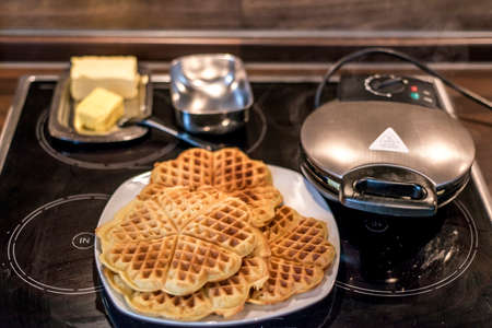Baking Homemade waffles cooked in a waffle ironの写真素材