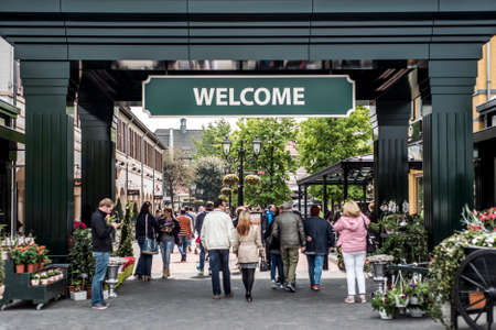 Roermond, Netherlands 07.05.2017 People walking around at the Mc Arthur Glen Designer Outlet...