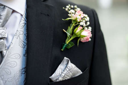 Pink rose boutonniere flower groom wedding coat with tie shirtの写真素材