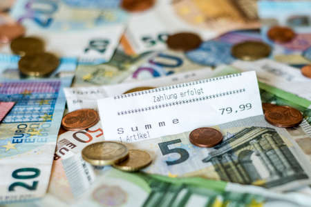 savings Cash money concept euro banknotes all sizes and cent coins on desk bill pay store text sum...