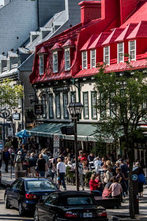 QUEBEC CITY, CANADA 13.09.2017 Red roof of famous Auberge du Tresor restaurant hotel in historic old...