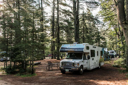 Canada Algonquin National Park 30.09.2017 Parked RV camper Lake two rivers Campground Beautiful natural forest landscapeのeditorial素材
