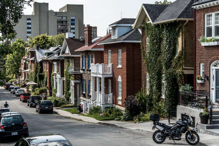 Quebec City, Canada 13.09.2017 cars parked in front of European architecture row houses in Old Quebec Canada editorialのeditorial素材