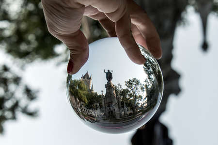 Canada Quebec City Fountain Monument of Faith woman in front of Chateau Frontenac tourist attraction UNESCO Heritageの写真素材
