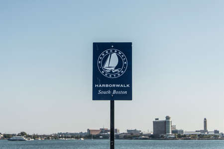 Tourist post sign Boston Harbor panorama walk isolated on a sunny summer day Long Wharfの写真素材