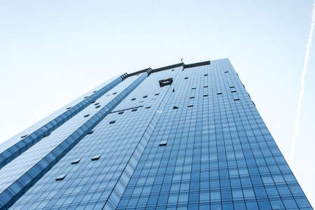 Boston Skyline syscraper group workers cleaning windows service on high rise building blue window