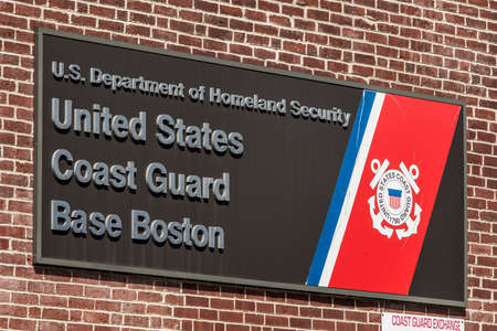 Boston, MA, USA 05.09.2017 - Sign of The US Coast Guard Home Base Boston on sunny dayのeditorial素材