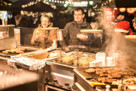 Koblenz GERMANY 16.12.2017 imbiss selling food meat and sausages Traditional Christmas market by nightのeditorial素材