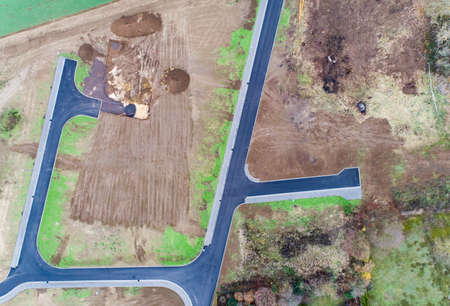 Aerial view of road streets guidelines new development area for real estate mome building arable...