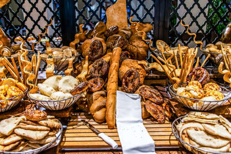 Bread bar station buffet catering, close-up Assortment of fresh pastry on table Pastry buffet set for breakfast in Egyptの写真素材