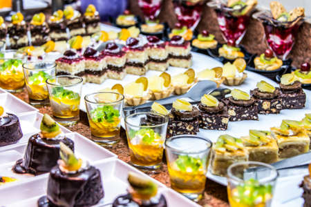 Close up delicious dessert pastry cakes Fresh colourful sweet berry desserts, beautifull decorated...