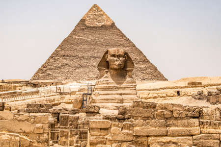 Egyptian Great Sphinx full body portrait head,with pyramids of Giza background Egypt empty with nobody. copy spaceの写真素材