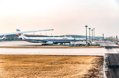 Bejing, China, 23.02.2019 Air China Airbus twin-engine jet airliner standing at the airport waiting for flightのeditorial素材
