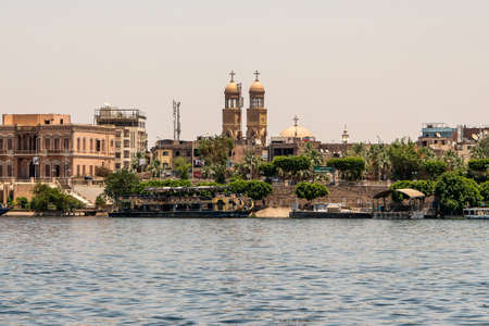 Luxor Egypt 18.05.2018 View on the Nile River with the Cruise Boat swimming Hotel on West Bank and near Luxorのeditorial素材