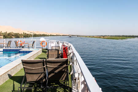 Luxor Egypt 18.05.2018 View on the Nile River with the Cruise Boat swimming Hotel on West Bank and near Luxorのeditorial素材