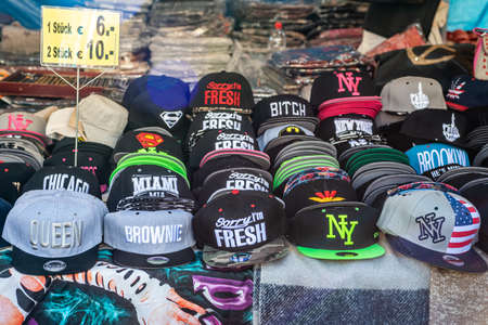 Mayen, Germany 14.10.2018 Baseball team and comic cap store with different colorful logo caps for saleのeditorial素材
