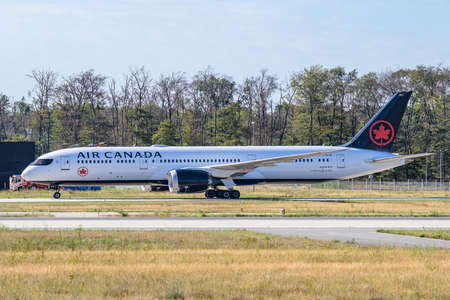 FRANKFURT,GERMANY 11.08.2019 Air Canada Airbus twin-engine jet airliner standing at the airport waiting for flightのeditorial素材