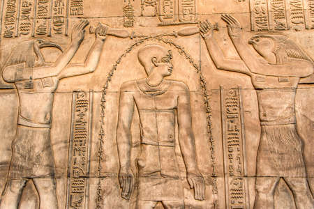Ruins and Hieroglyphs in the famous Temple of Kom Ombo in Egypt on nile river bankの写真素材