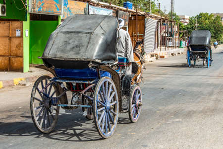 EDFU, EGYPT 19.05.2018 local Horse Carriage for tourists near the dock and the Horus Temple tour...