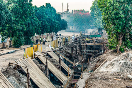 19.05.2018 Kom Ombo Egypt - Work Zone of Road construction near Ruins of the famous Temple of on nile river bankのeditorial素材