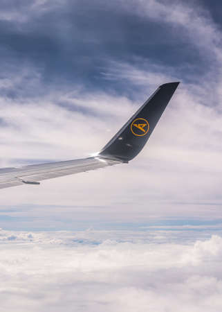 Frankfurt Germany 18.11.19 Condor Air wing of airplane in the sky winglet blue sky clouds.のeditorial素材